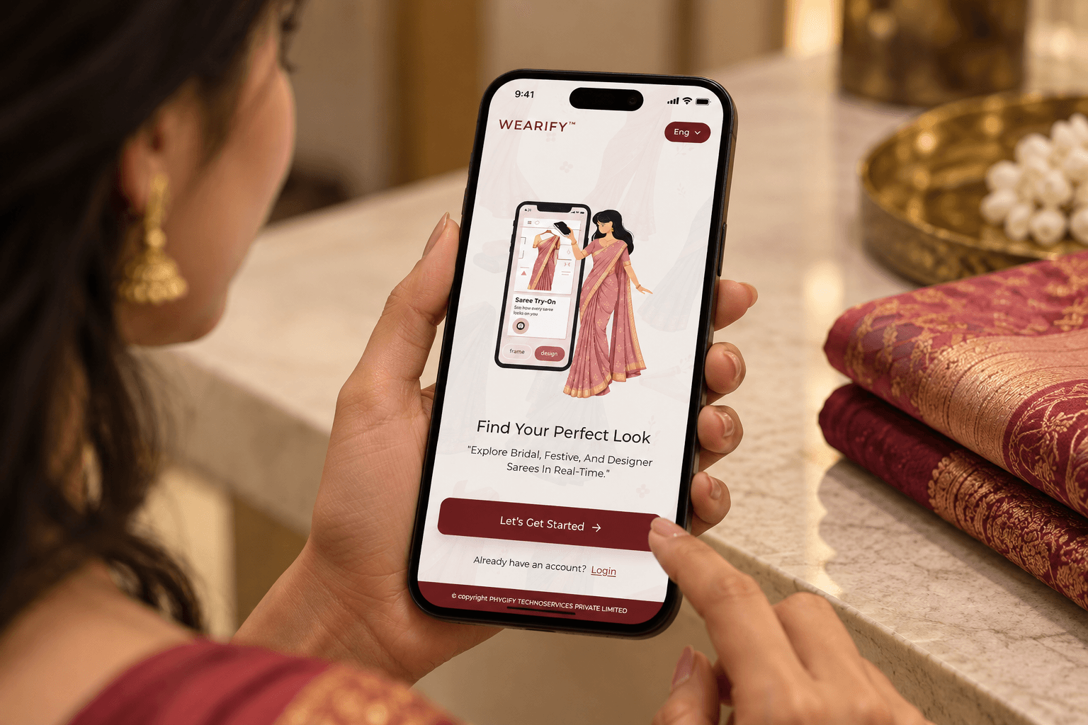 A shopper holding a phone with the Wearify Customer App open